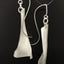 Unique curved matching silver earrings; Kinetic Earrings, Metal formed earrings