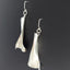 Unique curved matching silver earrings; Kinetic Earrings, Metal formed earrings