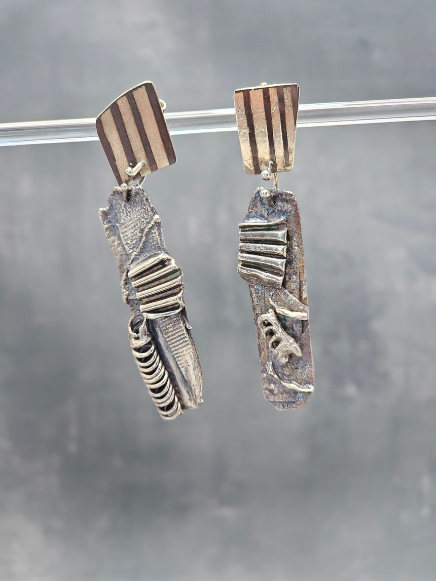 Recycled sterling silver earrings with kinetic post top
