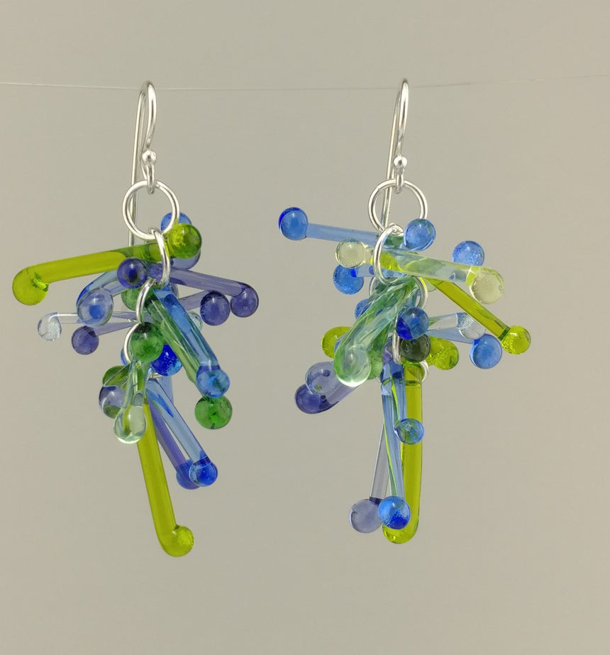 Shades of the Sea Kinetic Earrings of Lampwork Glass Jack with sterling silver ear wires.