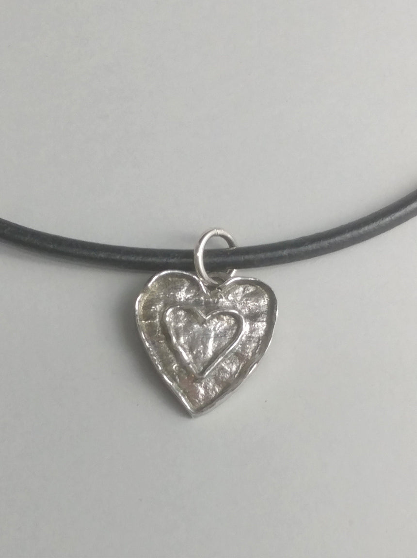 Reclaimed Silver Heart on Heart Pendant on a Leather Cord with silver clasp