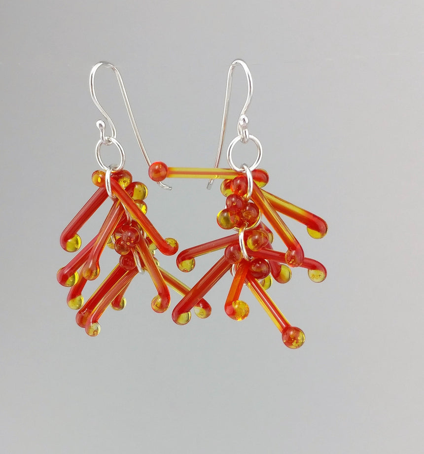 Shades of Flames Kinetic Earrings of Lampwork Glass Jack with sterling silver ear wires.